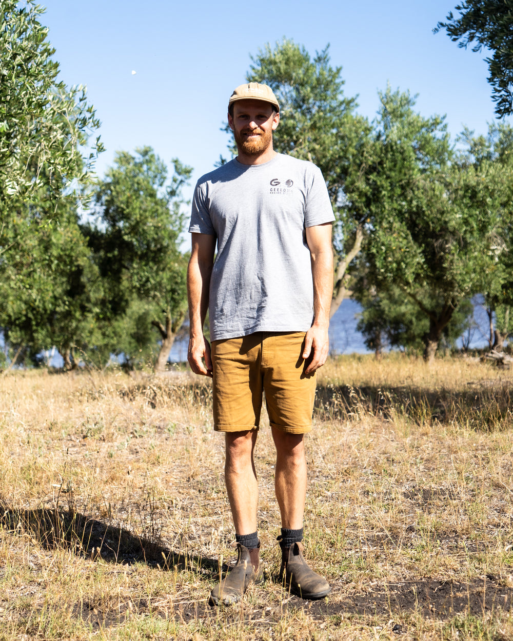 A grower standing in the grove